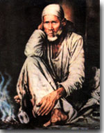Baba Sitting near 'dhuni'