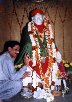 Guruji keeping your prayers at Baba's Lotus Feet